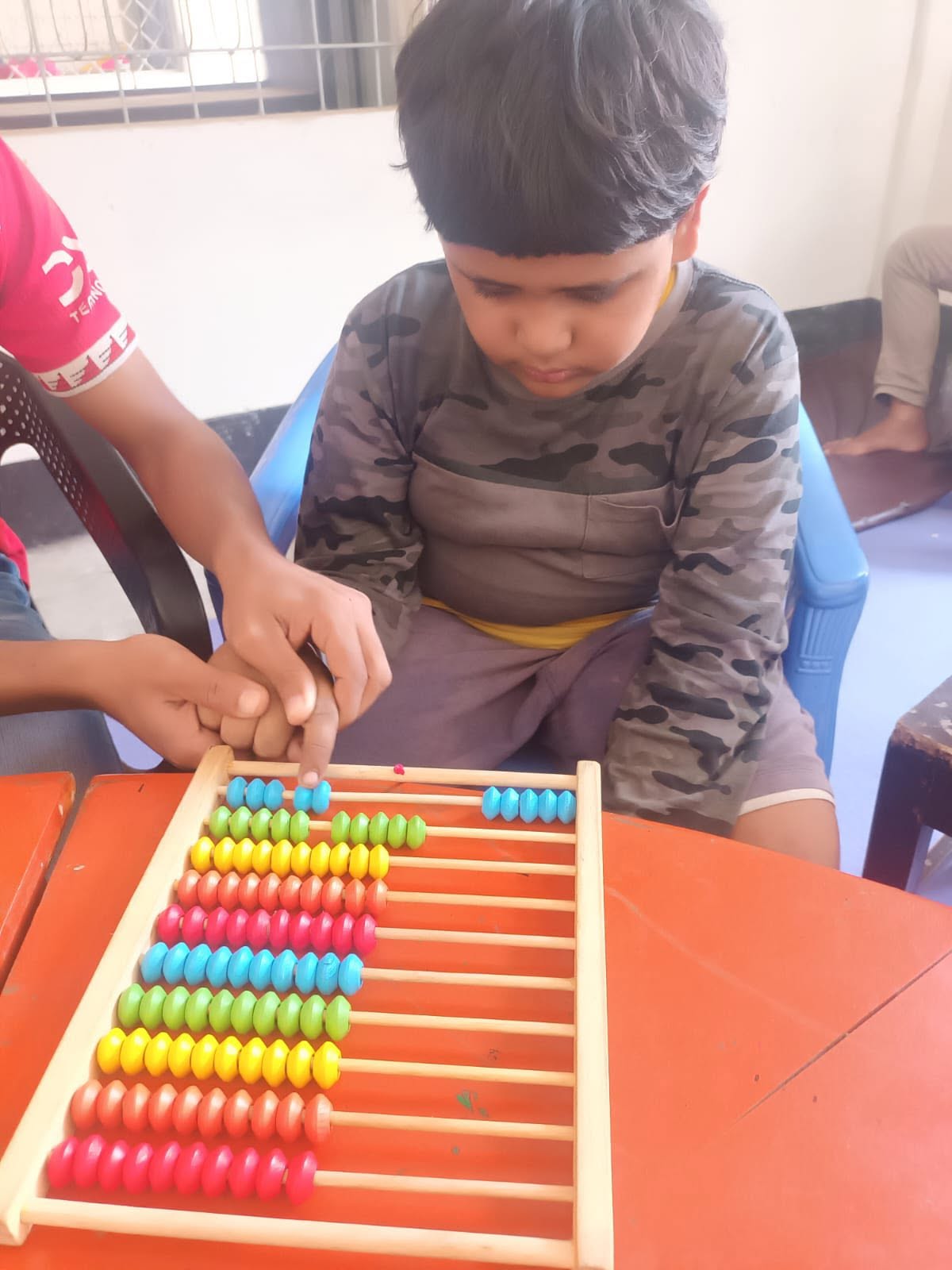 Children participating in guided education activity